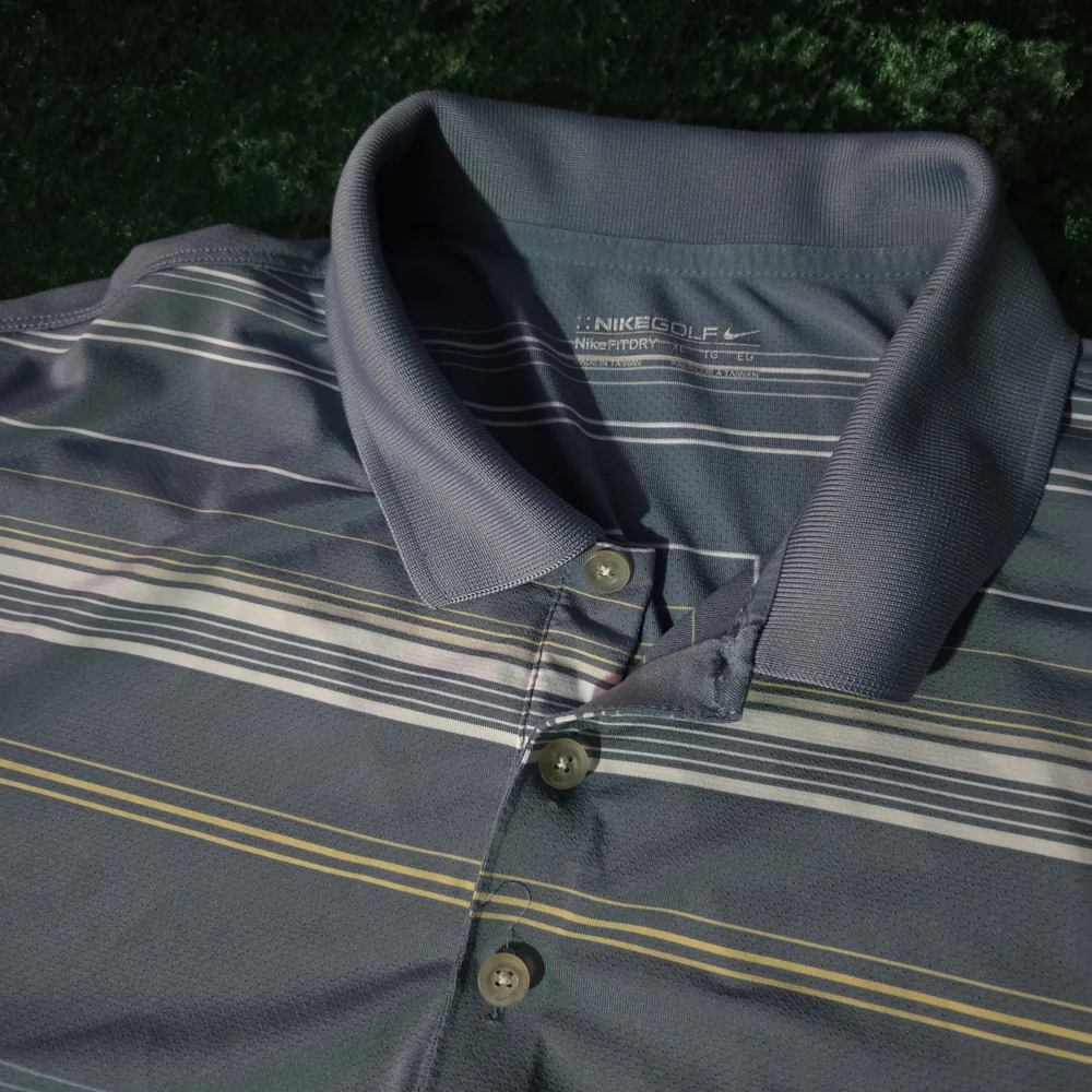 Nike Men's Polo in Blue with White and Yellow Stripes